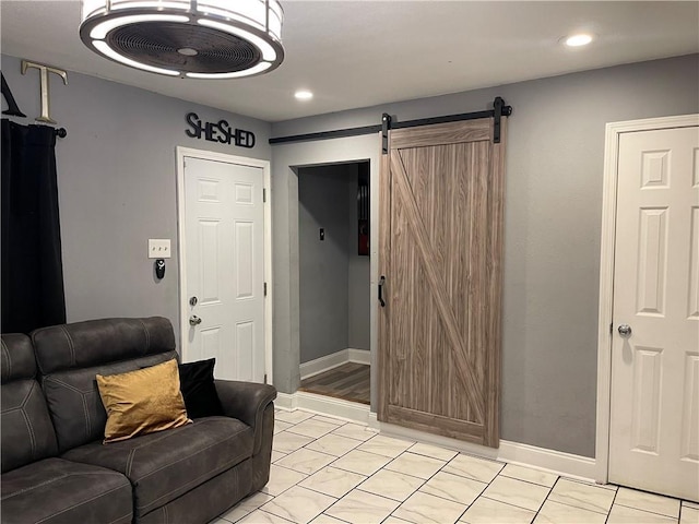 living room featuring a barn door