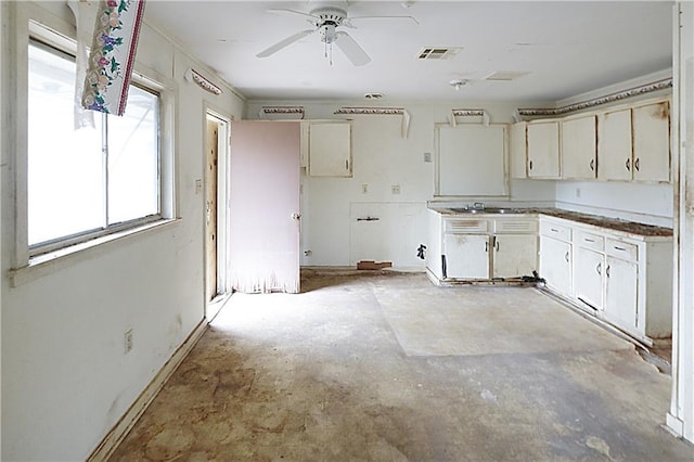 kitchen featuring ceiling fan