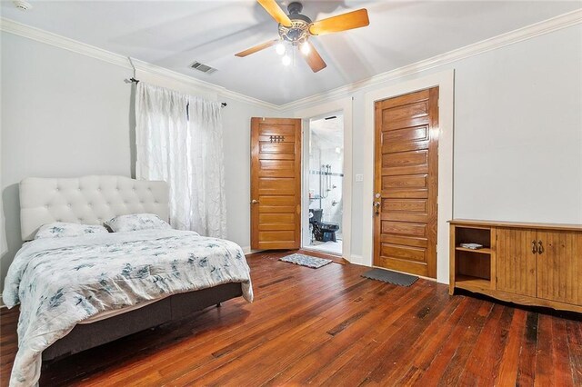 2301 Dauphine St, New Orleans, LA 70117 - bedroom with dark hardwood / wood-style flooring, ornamental molding, and ceiling fan
