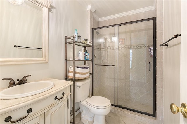 bathroom with an enclosed shower, vanity, ornamental molding, and toilet