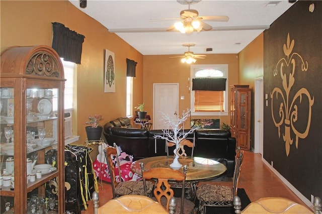 dining room featuring ceiling fan and hardwood / wood-style floors