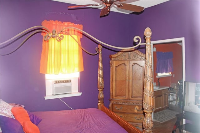 bedroom with ceiling fan and cooling unit