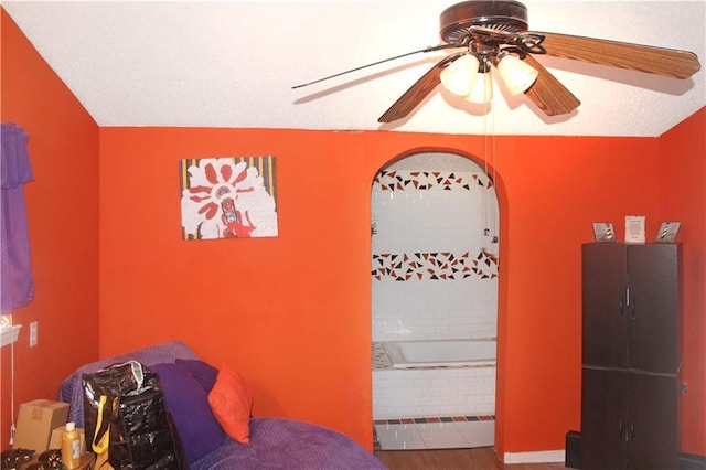 bedroom featuring ceiling fan and hardwood / wood-style flooring