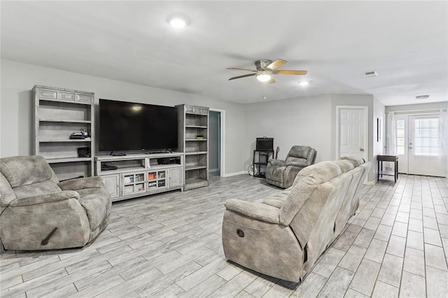 living room with ceiling fan