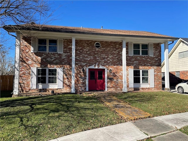 view of front of property with a front lawn