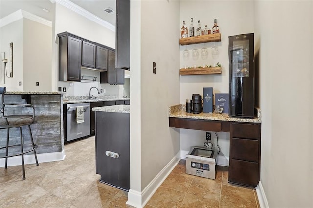 kitchen with dishwasher, sink, dark brown cabinets, light stone counters, and crown molding