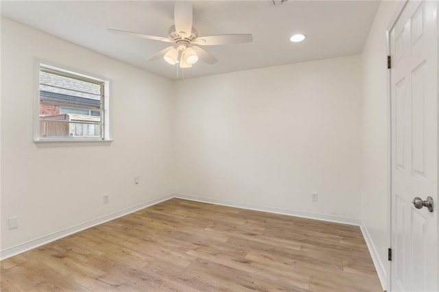 unfurnished room with ceiling fan, light wood finished floors, recessed lighting, and baseboards