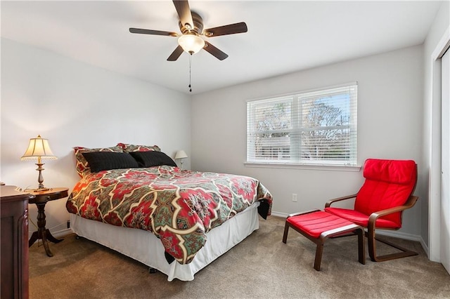 bedroom featuring ceiling fan and carpet flooring