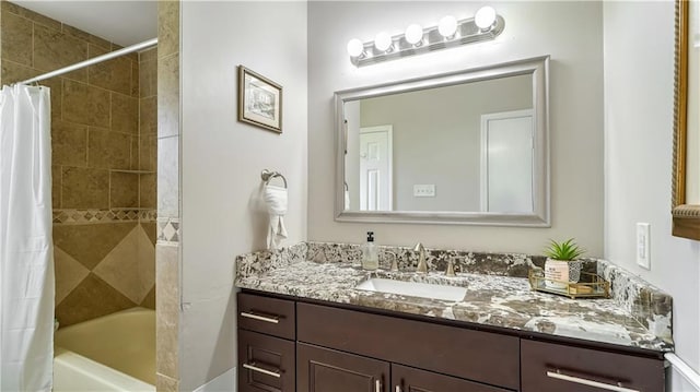 bathroom with vanity and shower / tub combo with curtain