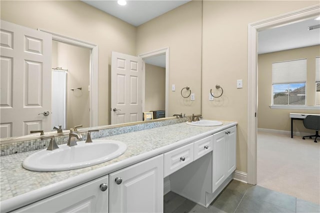 bathroom featuring vanity and tile patterned flooring