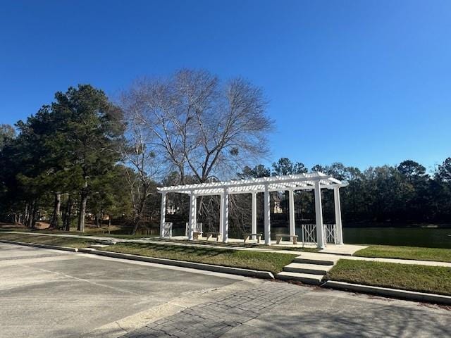 surrounding community featuring a pergola