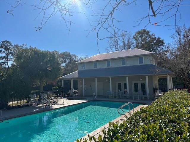 back of property with a patio area