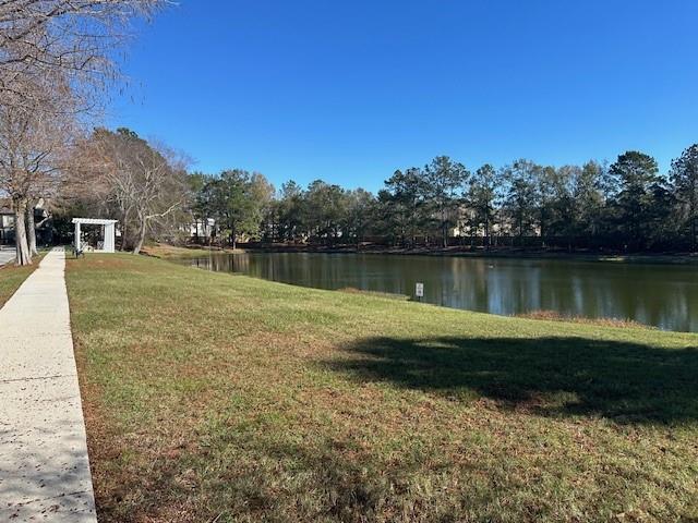 view of yard with a water view