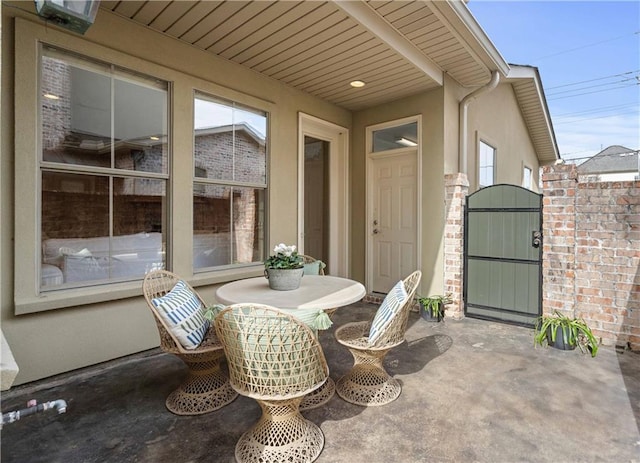 1207 Rue Degas, Mandeville, LA 70471 - view of patio / terrace featuring a gate