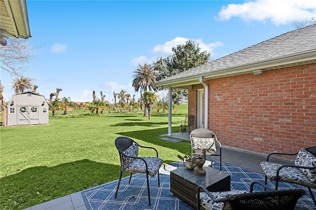 view of patio / terrace with an outbuilding and a storage unit