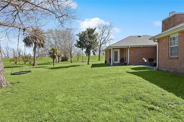 view of yard with a patio area