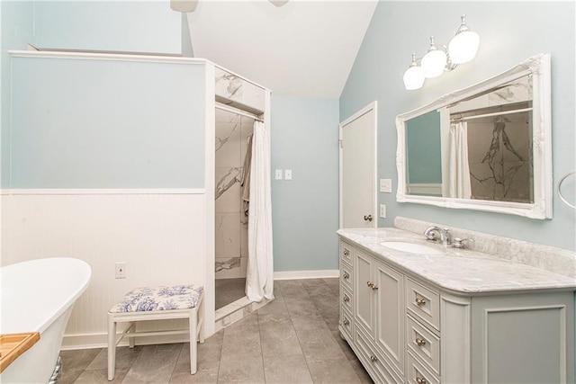 bathroom featuring vanity, vaulted ceiling, and curtained shower