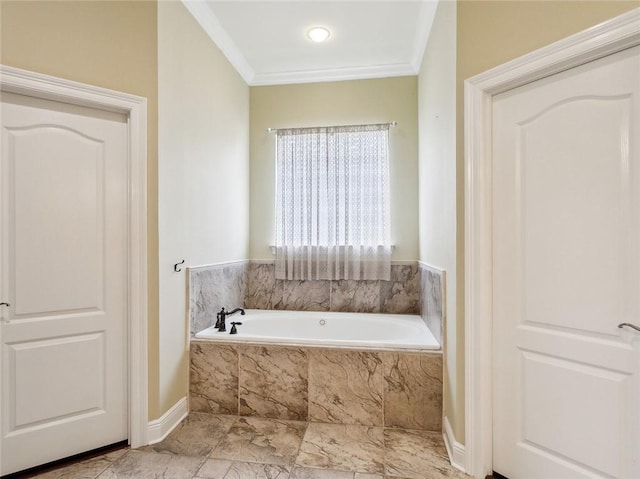 bathroom with tiled bath and crown molding