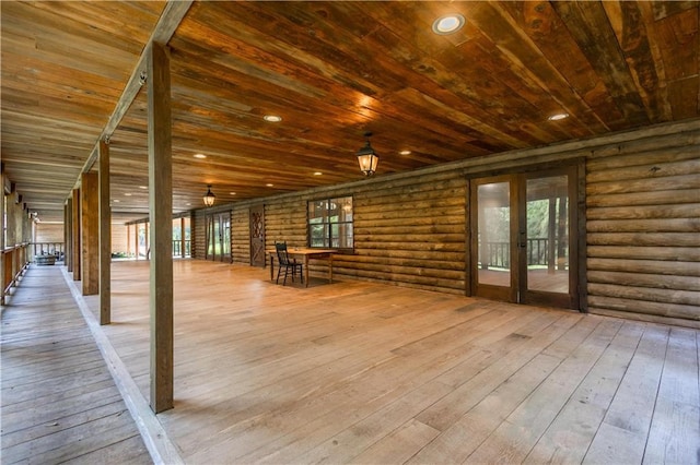 wooden deck featuring french doors