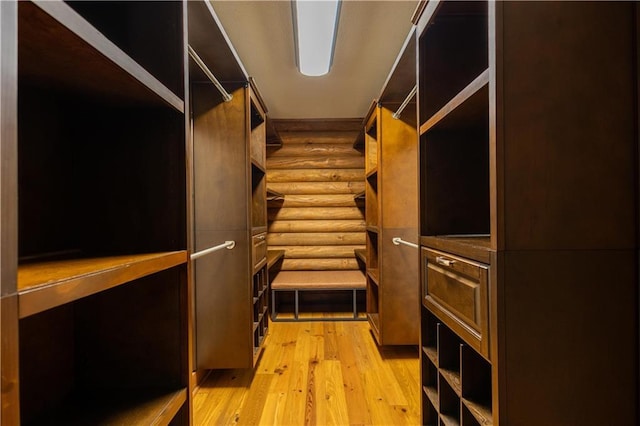 spacious closet featuring light wood-type flooring