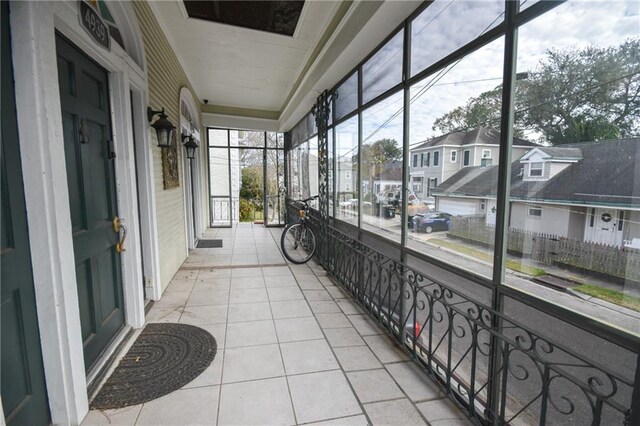 4937-39 S Miro St, New Orleans, LA 70125 - sunroom / solarium featuring a residential view