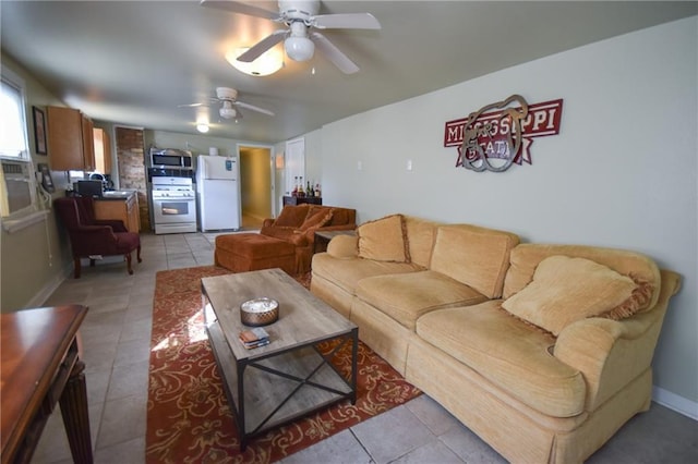 4937-39 S Miro St, New Orleans, LA 70125 - living area with baseboards, light tile patterned floors, and ceiling fan