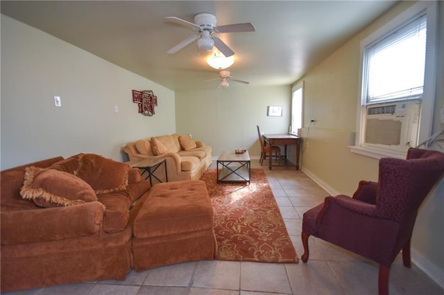 tiled living room featuring ceiling fan, a wealth of natural light, and cooling unit