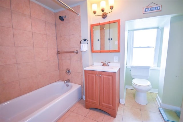 full bathroom with vanity, toilet, tiled shower / bath, and tile patterned flooring