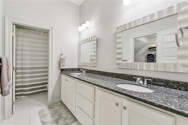 bathroom with vanity, tile patterned flooring, and a shower with curtain