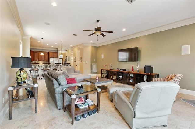 living room featuring crown molding and ceiling fan