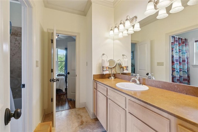 bathroom with vanity and crown molding