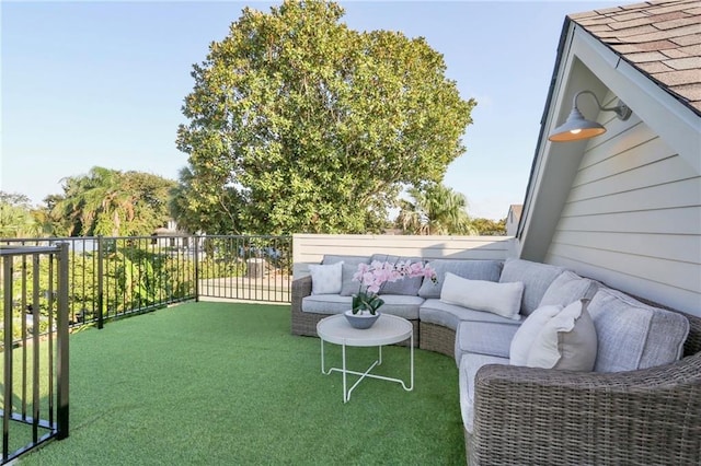 view of patio with an outdoor hangout area and a balcony