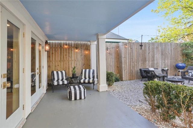 view of patio featuring french doors