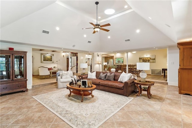 living room featuring high vaulted ceiling and ceiling fan