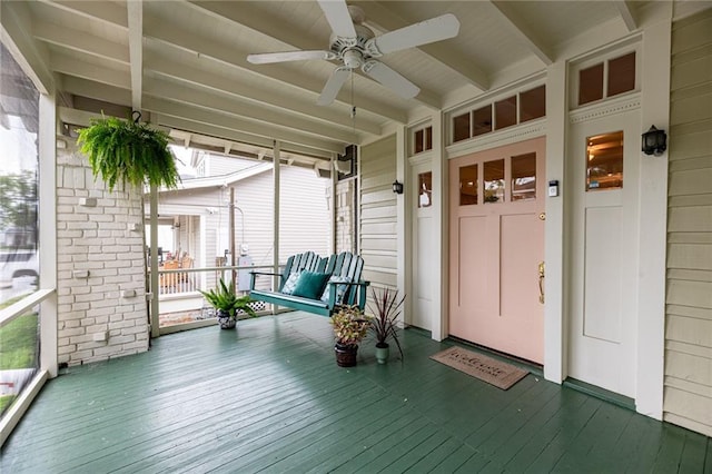 exterior space featuring covered porch and ceiling fan