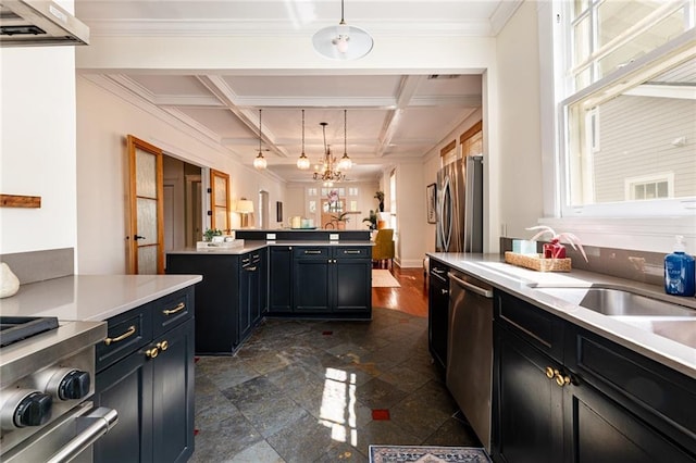 kitchen with pendant lighting, stainless steel appliances, kitchen peninsula, a chandelier, and coffered ceiling