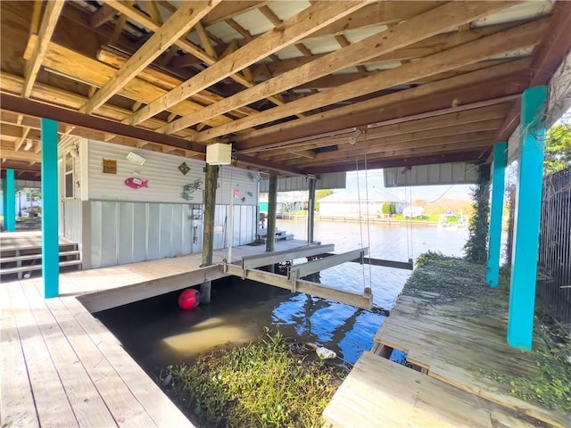 view of dock with a water view