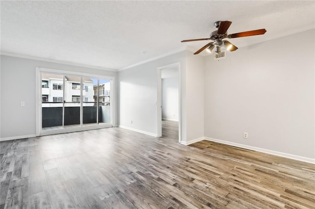 unfurnished living room featuring crown molding, hardwood / wood-style floors, and ceiling fan