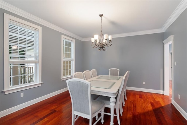 700 Dewey Ave, Slidell, LA 70458 - dining room featuring a chandelier, wood finished floors, and crown molding