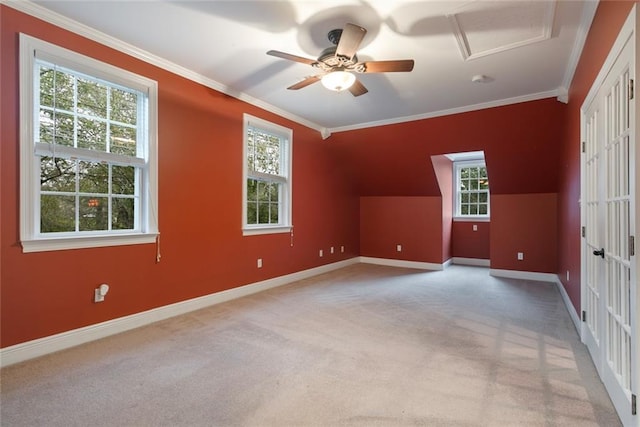 additional living space featuring lofted ceiling, carpet flooring, and ceiling fan