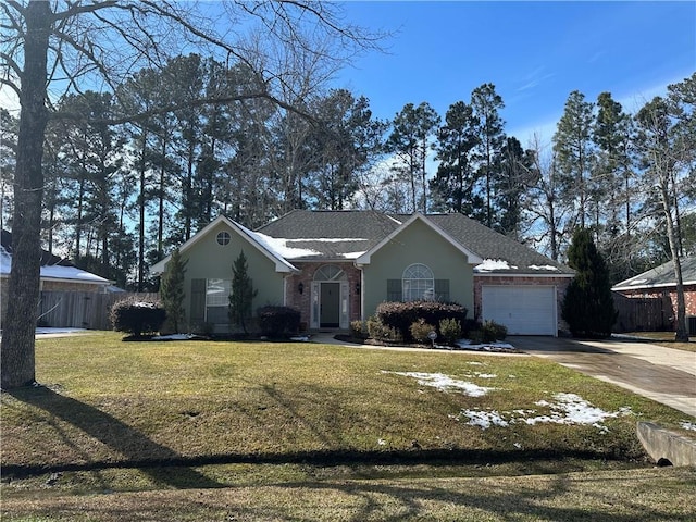 single story home featuring a garage and a front yard