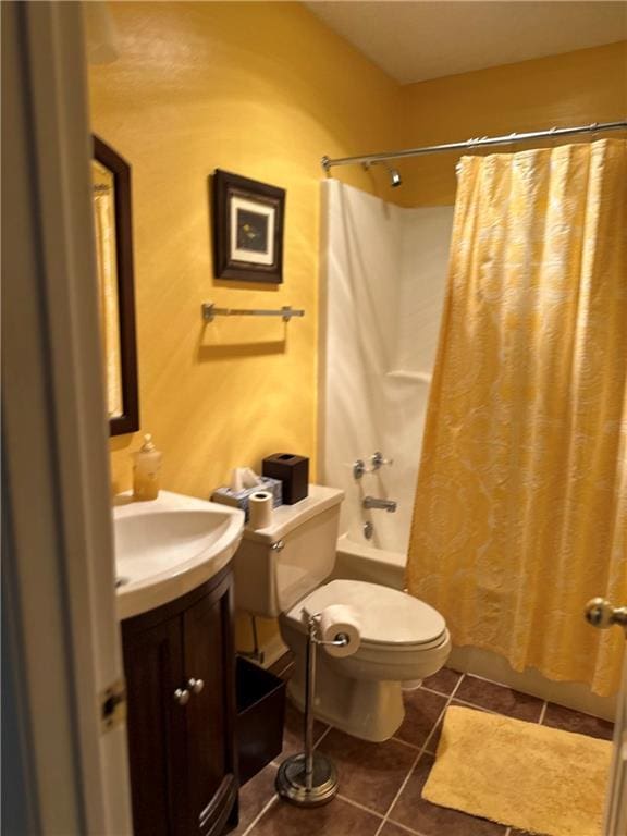 full bathroom with vanity, toilet, tile patterned floors, and shower / bath combo with shower curtain