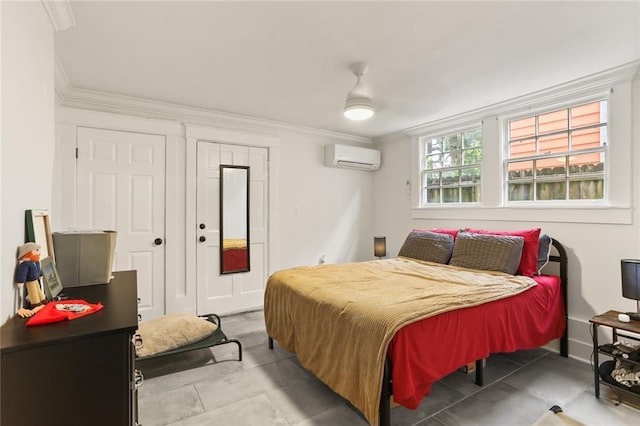 bedroom with ceiling fan, crown molding, and a wall unit AC