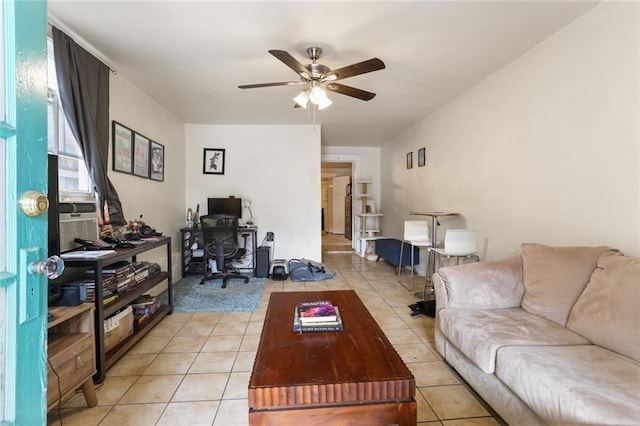 living room with ceiling fan, cooling unit, and light tile patterned floors