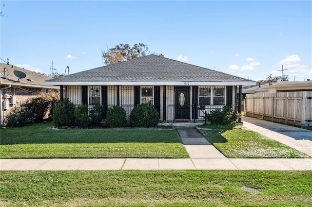 view of front of home with a front lawn