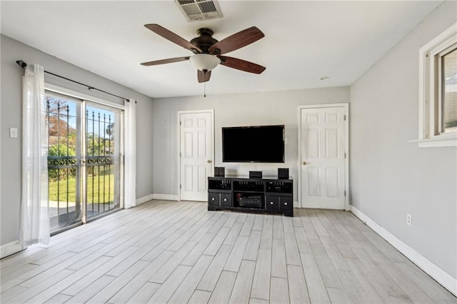 unfurnished living room with light hardwood / wood-style floors and ceiling fan