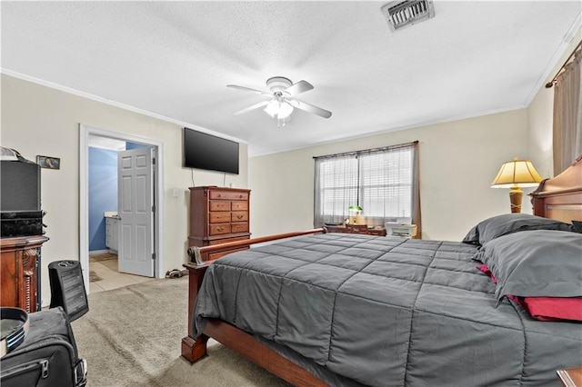 carpeted bedroom featuring ornamental molding and ceiling fan