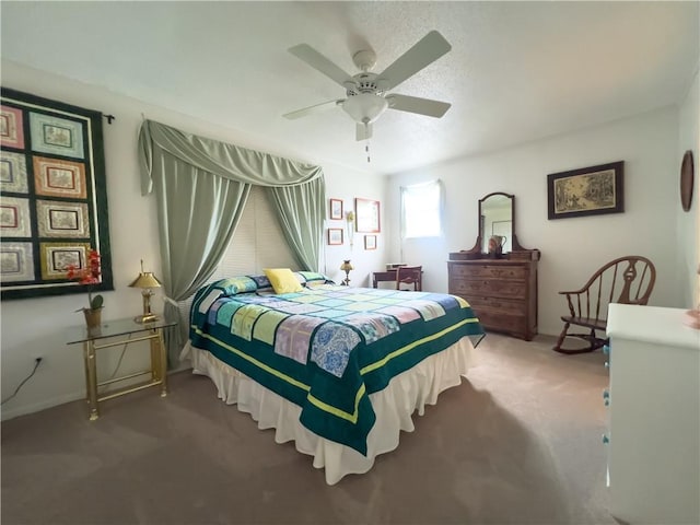 carpeted bedroom featuring a ceiling fan