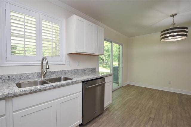 kitchen featuring sink, white cabinetry, light stone counters, decorative light fixtures, and stainless steel dishwasher