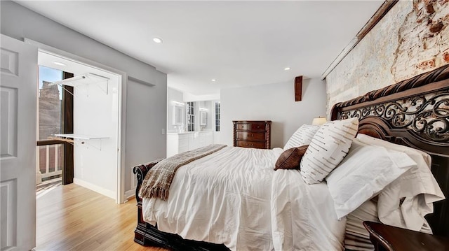 bedroom with light hardwood / wood-style floors